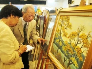 Oil paintings by Chairman of the HCM City Esperanto Association Tran Quan Ngoc (Photo: VNA)
